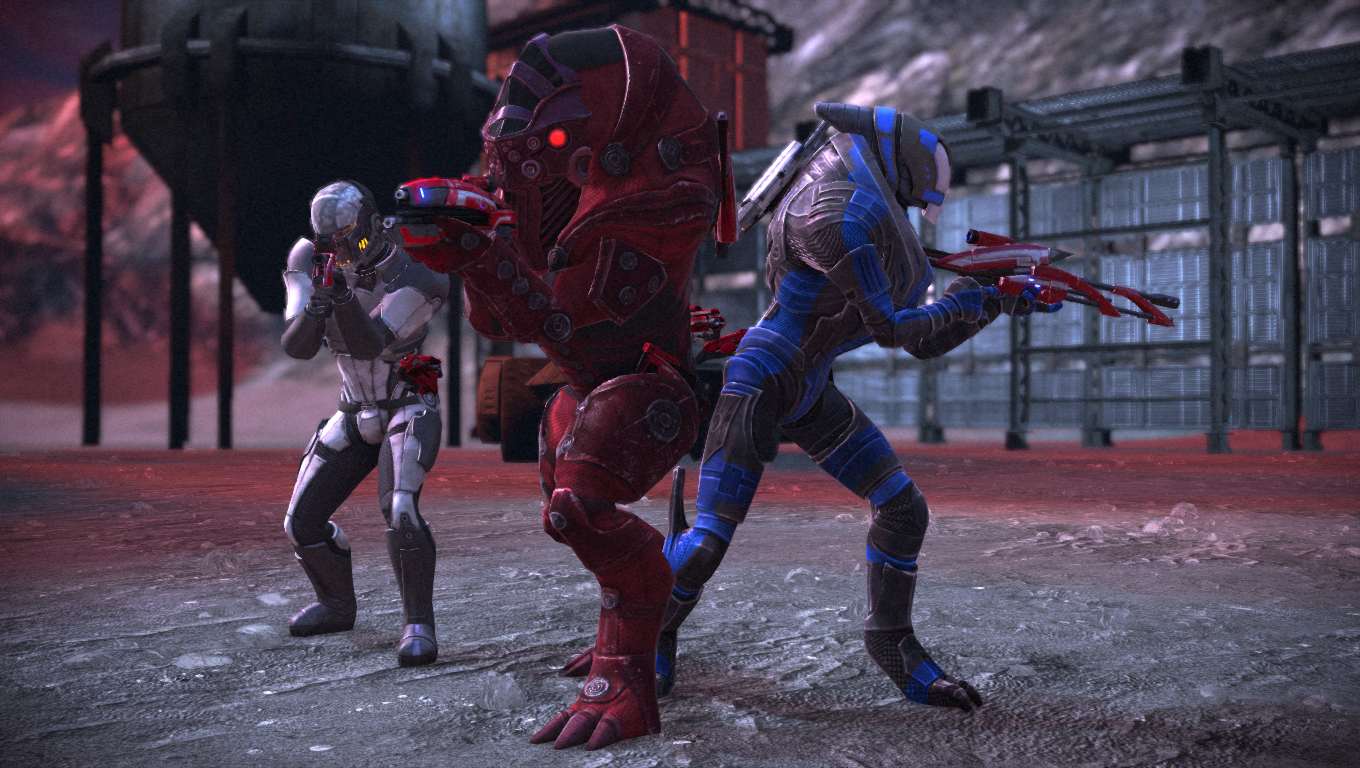 Commander Shephard, Garrus and Wrex shooting in full armor.