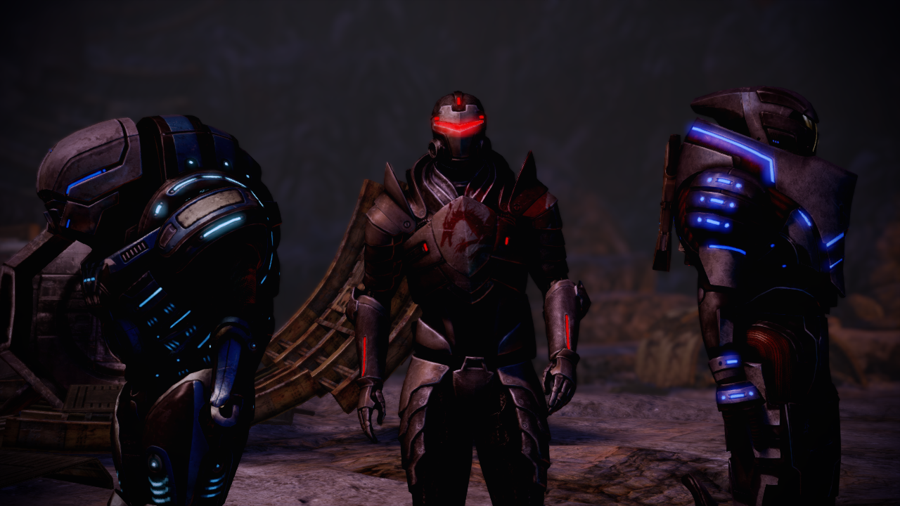 Garrus, Grunt and Shephard standing facing away from each other.