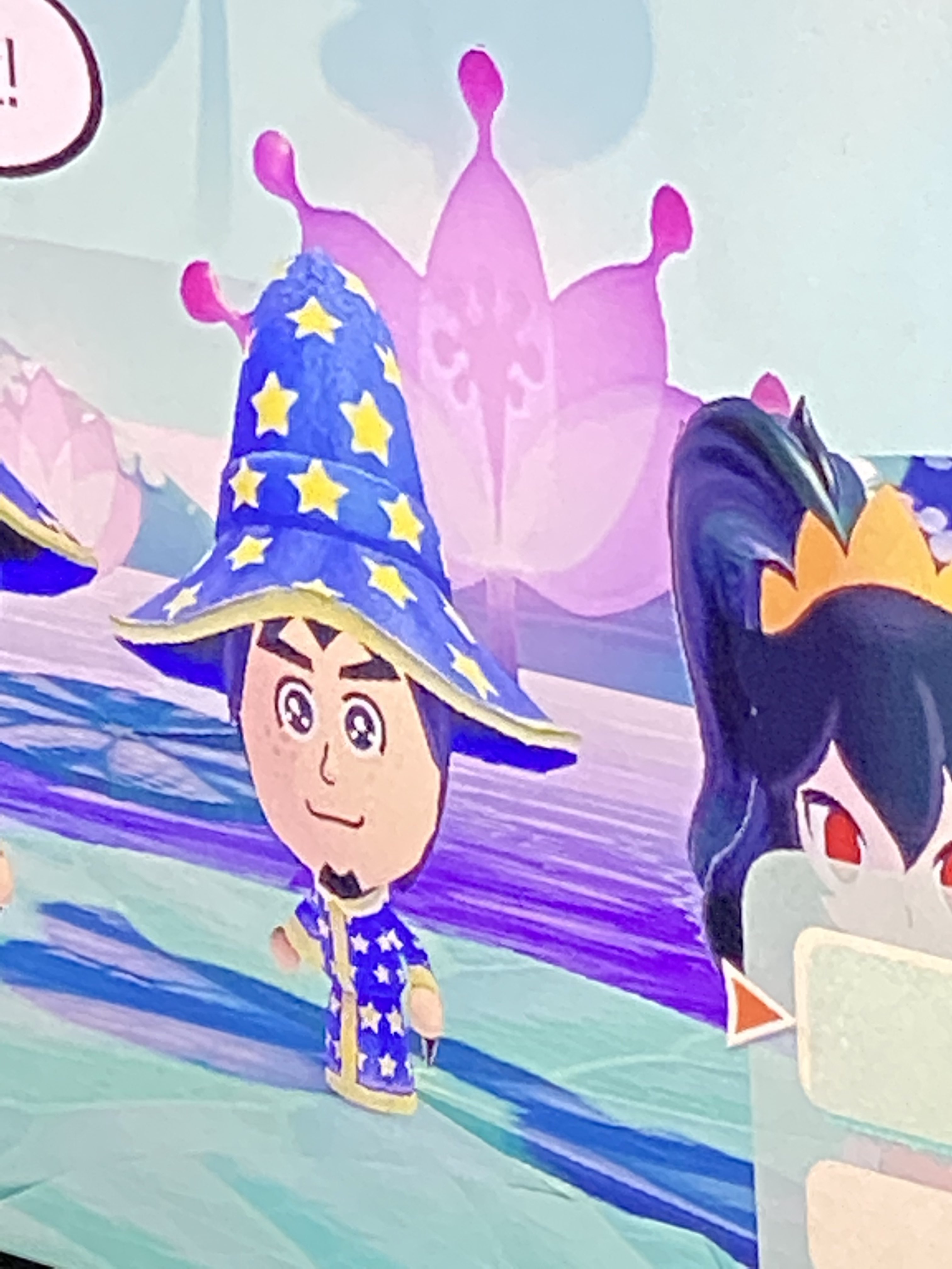 A wizard mii next to a mii of Ashley from Warioware.